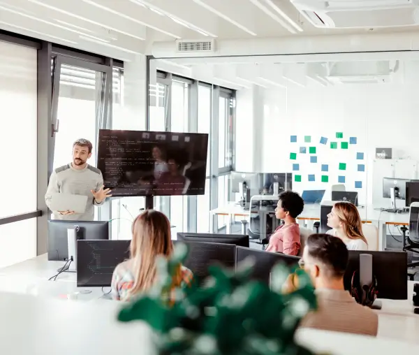 Professional giving presentation to colleagues